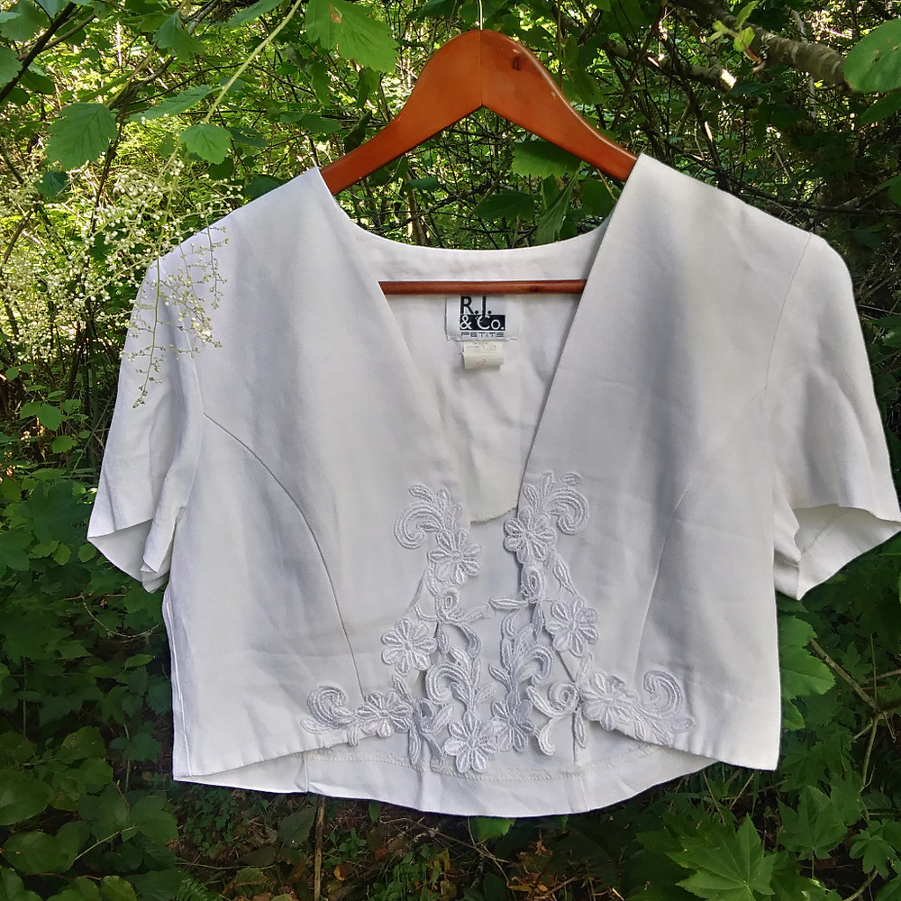 white overcoat with Irish crochet